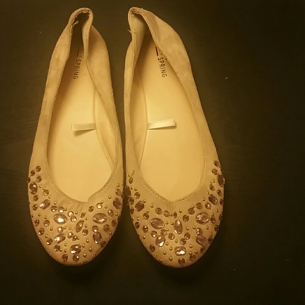 Call it Spring tan flats with purple stones